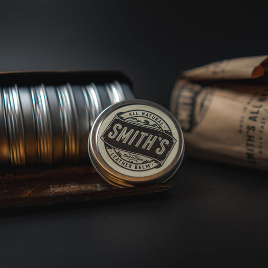 Tins of leather balm