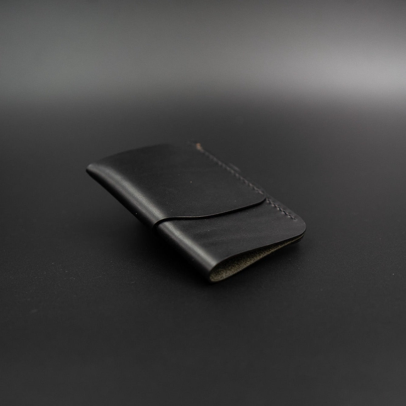 Black vertical leather wallet