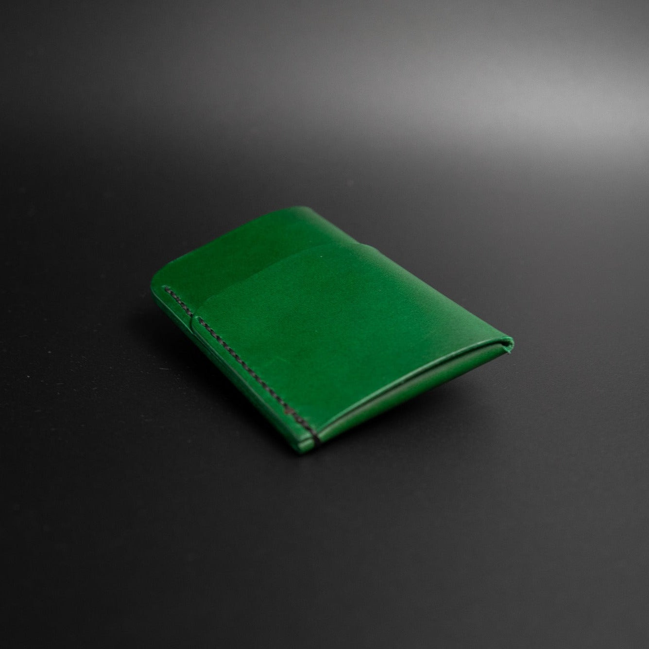 Green vertical leather wallet