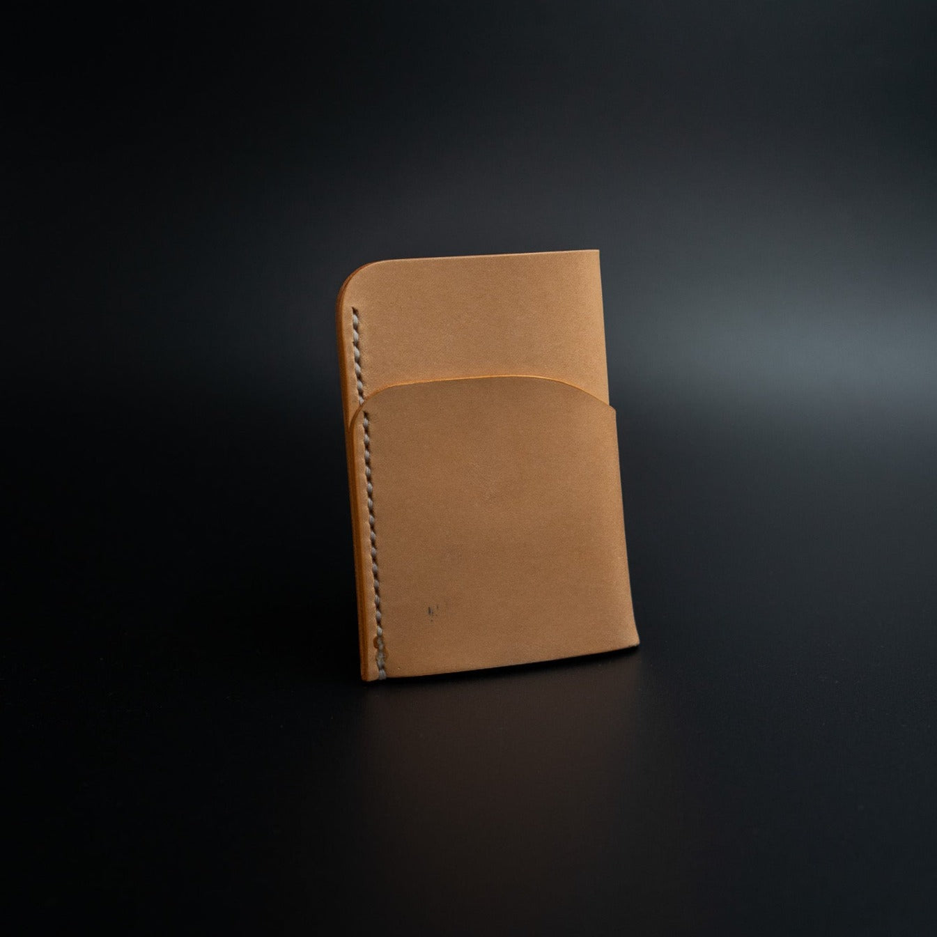Natural vertical leather wallet